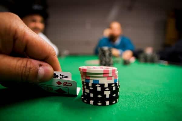 This is a picture of a stack of poker chips on a poker table during a poker game. On this page you can learn about angle shooting strategy, and a list of video with examples of how professional poker players tried to paly an angle.