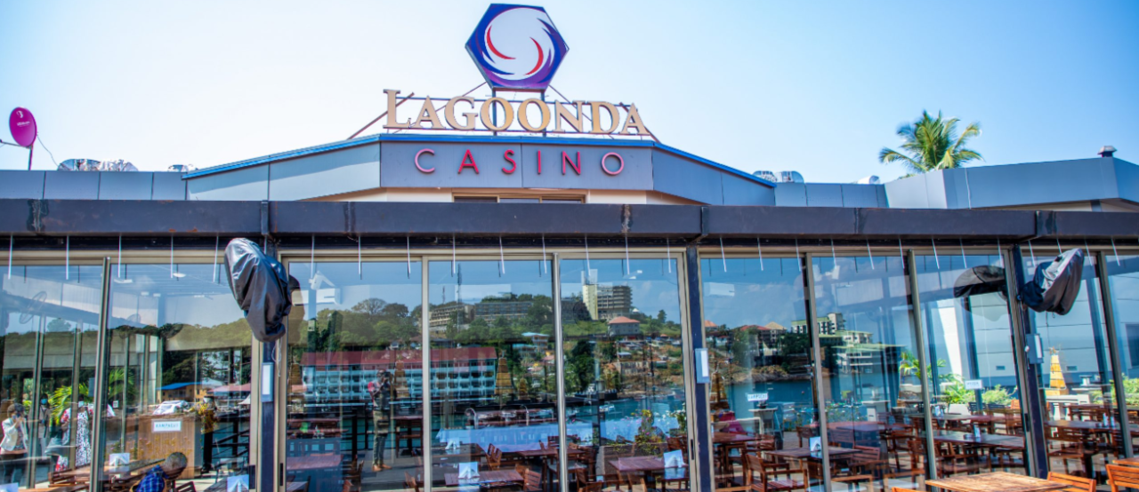 This is a photo of the exterior and front entrance of Lagoonda Casino in Freetown, the capital of the Republic of Sierra Leone. Under the picture, on this page, you can read about the legal status of the various forms of Sierra Leonian games of chance: internet lottery, digital bingo, electronic poker, sports betting, crypto wagering. There is also info about betting on blood sports, the licensing system, taxation regime, and you can find a list of licensed online gambling websites, which accept Sierra Leonean players.