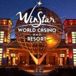 This is a picture of the front gate of WinStar World Casino which is the biggest land-based Native American casino in Oklahoma. Next to the picture, you can read about the gambling establishments, the legal status of online casinos, crypto casinos and tribal casinos in OK, taxation of winnings and legal gambling age in the state.
