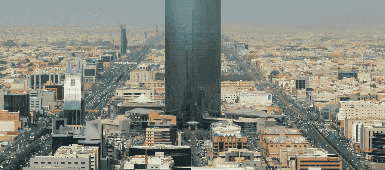 This a photo of the skyline of Riyadh, the capital of Kingdom of Saudi Arabia, with the 302 meters Kingdom Centre tower visible. Under the picture, on this page, you can read about the legal status of the various forms of Saudi Arabian games of chance: internet lottery, digital bingo, electronic poker, sports betting, crypto wagering. There is also info about illegal gambling, sharia law and betting on blood sports, the licensing system, taxation regime, and you can find a list of licensed online gambling websites, which accept Saudi Arabia players.