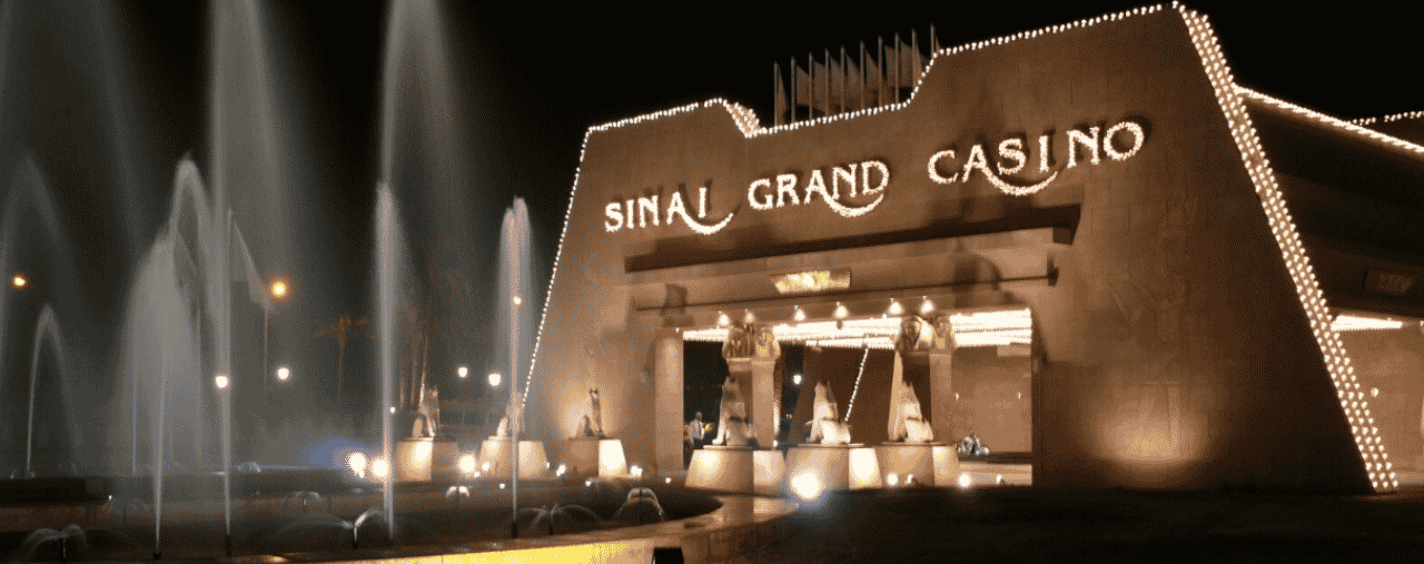 This a photo of the front entrance of Sinai Grand Casino in Sharm el-Sheikh, at night. This is one of the biggest and certainly the most well known gambling establishment of Egypt. Under the picture, on this page, you can read about the legal status of the various forms of Arab Republic of Egypt games of chance: internet lottery, digital bingo, electronic poker, sports betting, crypto wagering. There is also info about betting on blood sports, the licensing system, and taxation of gambling winnings, and you can find a list of licensed online gambling websites, which accept Egyptian players.