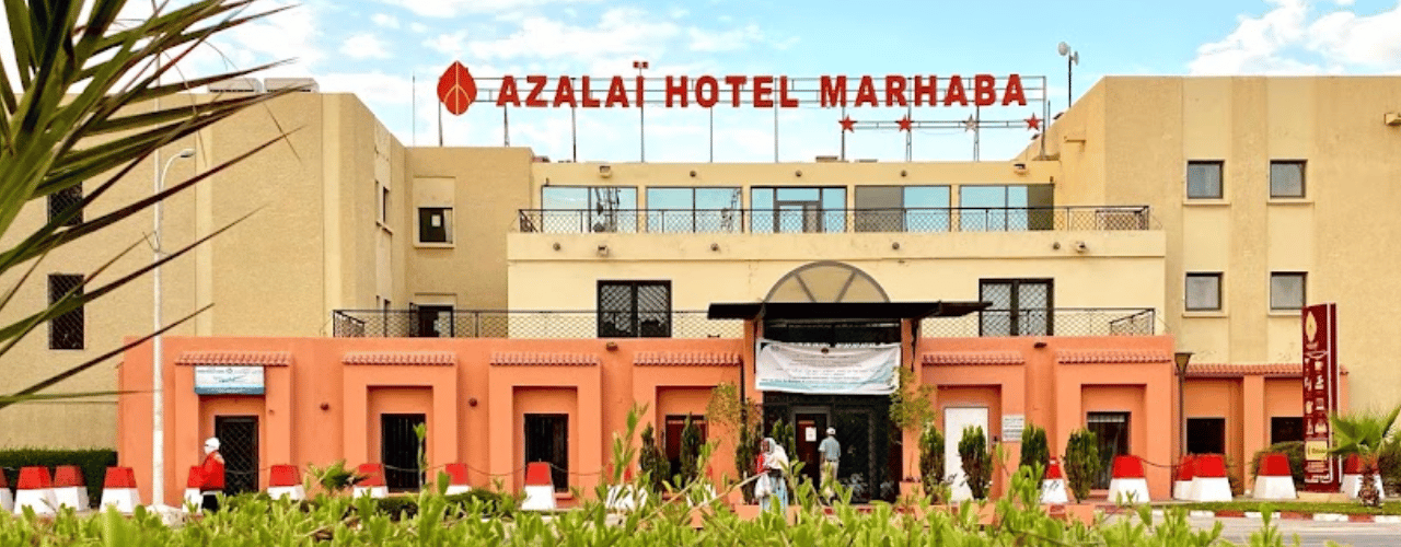 This photo of the front entrance of Azalaï Hôtel Marhaba, in Nouakchott, the capital of the Islamic Republic of Mauritania. Under the picture, on this page, you can read about the legal status of the various forms of Mauritanian games of chance: internet lottery, digital bingo, electronic poker, sports betting, crypto wagering. There is also info about illegal gambling, sharia law and betting on blood sports, the licensing system, taxation regime, and you can find a list of licensed online gambling websites, which accept Mauritanian players.