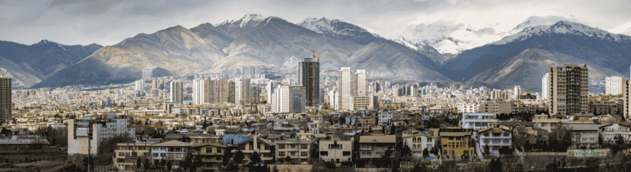 This photo of the skyline of Tehran, the capital of the Islamic Republic of Iran. Under the picture, on this page, you can read about the legal status of the various forms of Irani games of chance: internet lottery, digital bingo, electronic poker, sports betting, crypto wagering. There is also info about illegal gambling, sharia law and betting on blood sports, the licensing system, taxation regime, and you can find a list of licensed online gambling websites, which accept Irani players.