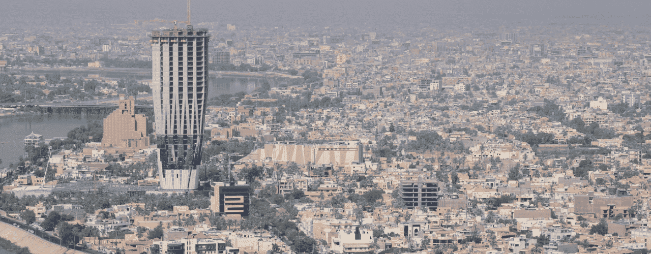 This photo of the skyline of Baghdad, the capital of the Republic of Iraq. Under the picture, on this page, you can read about the legal status of the various forms of Iraqi games of chance: internet lottery, digital bingo, electronic poker, sports betting, crypto wagering. There is also info about illegal gambling, sharia law and betting on blood sports, the licensing system, taxation regime, and you can find a list of licensed online gambling websites, which accept Iraqi players.