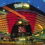 This is a picture of the decorative front facade and entrance of Holland Casino Scheveningen. To the right of the picture you can read more about this gambling venue.