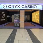 This is a picture of the entrance gate of Onyx Casino in Nyíregyháza, Hungary. You can read more about the casino next to the picture.