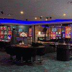 This is a picture of the interior of Moonlite Casino. This is the third casino on this list of the top 5 best rated and biggest casinos of Botswana. You can find the other venues above and below this one. You can read more about this gaming venue to the right of the picture: its' address, opening hours, dress code, entrance fee, and you can watch a video of the venue as well.
