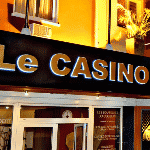 This is a picture of the front entrance and sign of the casino section of Hôtel Colbert. This is the biggest casino of Madagascar. You can read more about this casino gambling establishment to the right of the picture: its' address, opening hours, dress code, entrance fee, and you can watch a video of the venue as well.