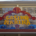 This is a picture of the sign of Casino Marina. You can read more about this casino gambling establishment to the right of the picture: its' address, opening hours, dress code, entrance fee, and you can watch a video of the venue as well.