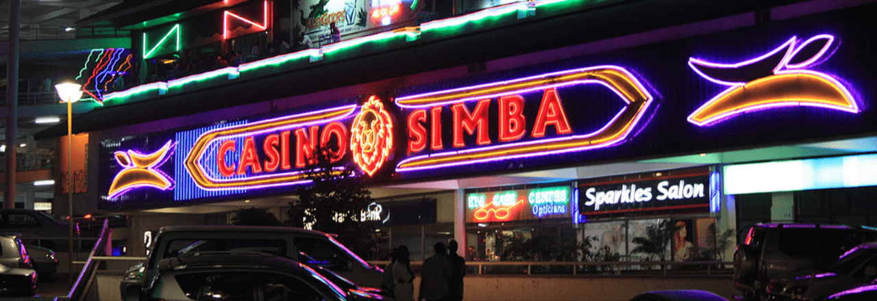 This is a photo of the front entrance of Casino Simba in Kampala, the capital of the Republic of Uganda. Under this picture, on this page, you can find a list of all terrestrial Ugandan casinos, info about the legal status of gaming venues, slot halls, their taxation regime, licensing system, and you can find a list of Uganda licensed online casinos, which accept players from the country.