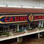 This is a picture of Casino Simba, located in the capital Kampala. Additionally, this is first element of this list of the 3 biggest and best rated Uganda casinos. You can find the other venues below this one. You can read more about this gaming venue to the right of the picture: its' address, opening hours, dress code, entrance fee, and you can watch a video of the venue as well.