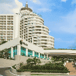 This is a picture of the building, sign and front gate of Enjoy Punta del Este Resort y Casino in the resort town of Punta del Este, in the Oriental Republic of Uruguay. This is the biggest casino in the country right now. This is the first casino on this list of the TOP 5 best rated and biggest casinos in Uruguay, you can find the other gaming venues on this list under this one. To the right of the picture you can read more about this casino.