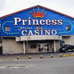 This is a picture of the building, sign and front gate of Princess Phoenicia Casino & Hotel in Paramaribo, the capital of the Republic of Suriname. To the right of the picture you can read more about this casino.