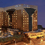 This is an aerial photograph of the main tower of Sonesta Hotel, Tower & Casino in Cairo, at night. You can read more about this gaming venue to the right of the picture: its' address, opening hours, dress code, entrance fee, and you can watch a video of the venue as well.
